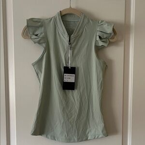 Golf Flairway Sleeveless Ruffle Shoulder Zip-Front Top in Pale Sage